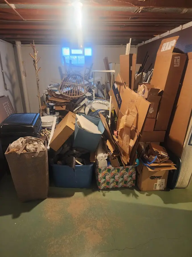 Roll-off dumpster container at job site for Yard Waste Dumpster Rental in Mint Hill